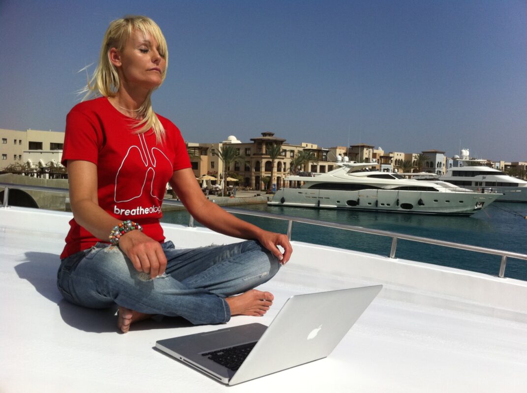Woman Meditating on a Boat